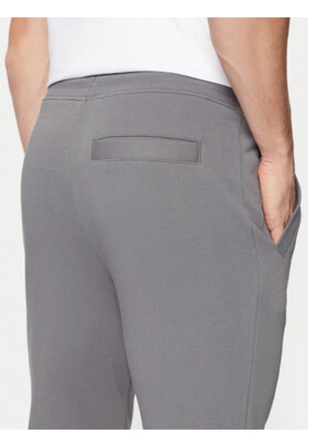 Hugo - HUGO Spodnie dresowe Doak212 50447963 Szary Regular Fit. Kolor: szary. Materiał: bawełna