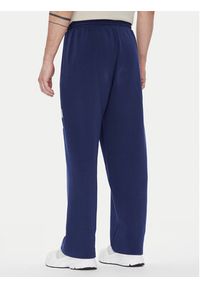 Adidas - adidas Spodnie dresowe Collegiate JM9179 Niebieski Regular Fit. Kolor: niebieski. Materiał: syntetyk, bawełna #5