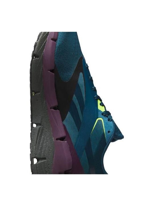 Buty do biegania męskie Reebok 100206737. Kolor: niebieski. Materiał: syntetyk, materiał. Szerokość cholewki: normalna. Sport: bieganie