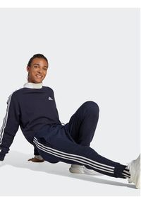 Adidas - adidas Spodnie dresowe Essentials French Terry Tapered Cuff 3-Stripes Joggers IC9406 Niebieski Regular Fit. Kolor: niebieski. Materiał: bawełna #2