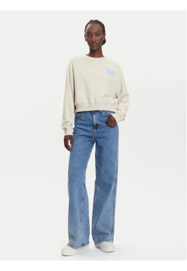 Tommy Jeans Bluza DW0DW21345 Beżowy Relaxed Fit. Kolor: beżowy. Materiał: bawełna