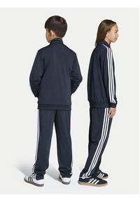 Adidas - adidas Spodnie dresowe Firebird Track KE0910 Czarny Regular Fit. Kolor: czarny. Materiał: syntetyk #3