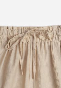 Renee - Beżowe Szerokie Spodnie z Wiskozy i Gumką w Pasie Abyga. Okazja: na co dzień. Kolor: beżowy. Materiał: wiskoza. Styl: casual #6