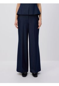 Reserved - Spodnie z kantem - granatowy. Kolor: niebieski. Materiał: tkanina, wiskoza #1