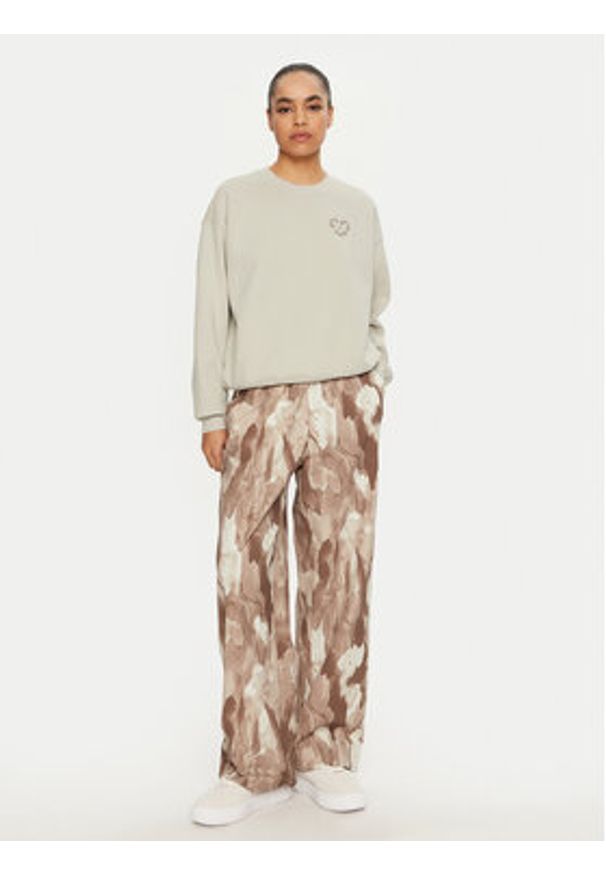 Champion Bluza 117494 Écru Loose Fit. Materiał: syntetyk