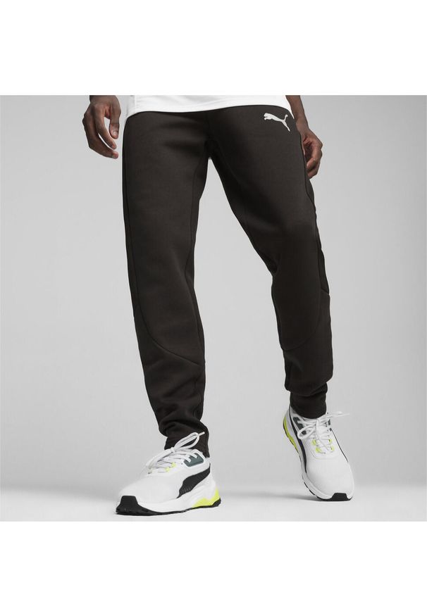 Puma - Męskie spodnie dresowe EVOSTRIPE PUMA Black. Kolor: czarny. Materiał: dresówka
