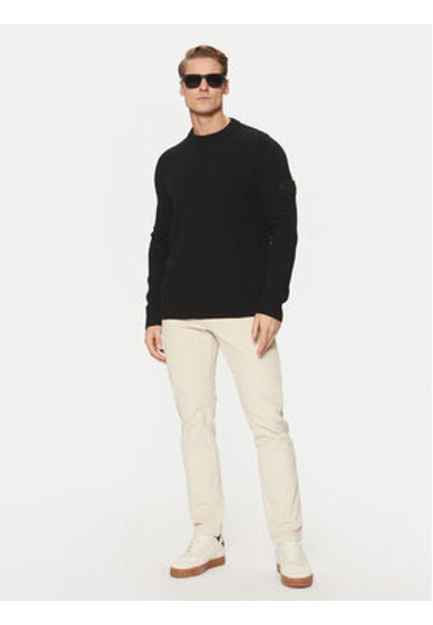 Stone Island Sweter 8115527FA Czarny Regular Fit. Kolor: czarny. Materiał: wełna