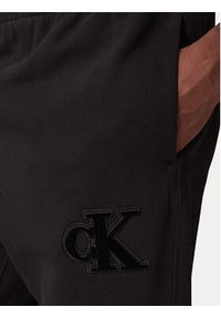 Calvin Klein Jeans Spodnie dresowe GSM LV04RD252G Czarny Regular Fit. Kolor: czarny. Materiał: bawełna #4