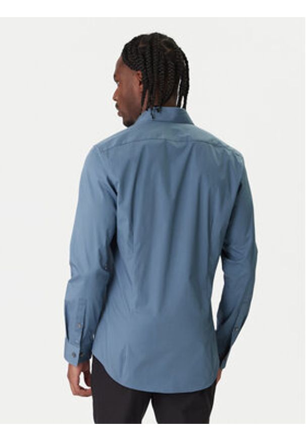 Calvin Klein Koszula Essentials LV019EU037 Niebieski Slim Fit. Kolor: niebieski. Materiał: bawełna