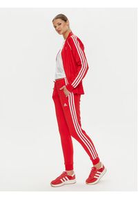 Adidas - adidas Spodnie dresowe Essentials 3-Stripes IY1719 Czerwony Slim Fit. Kolor: czerwony. Materiał: bawełna #3