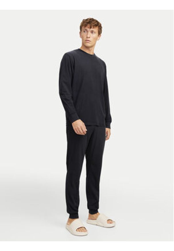 Jack & Jones - Jack&Jones Piżama Solid 12268536 Czarny Loose Fit. Kolor: czarny. Materiał: syntetyk