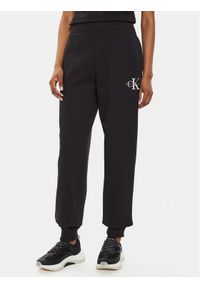 Calvin Klein Jeans Spodnie dresowe Monologo J20J223590 Czarny Relaxed Fit. Kolor: czarny. Materiał: syntetyk, bawełna