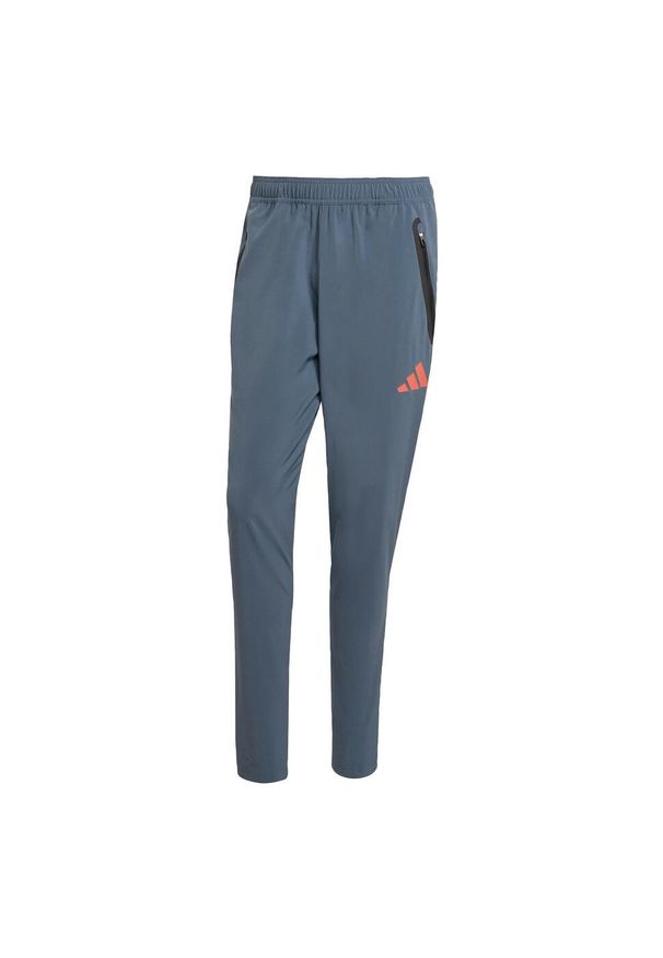 Adidas - FC Bayern Tiro 25 Competition Vis Tech Travel Pants. Kolor: pomarańczowy, wielokolorowy, szary