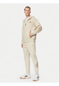 Adidas - adidas Spodnie dresowe Future Icons 3-Stripes KD5206 Beżowy Regular Fit. Kolor: beżowy. Materiał: bawełna #3