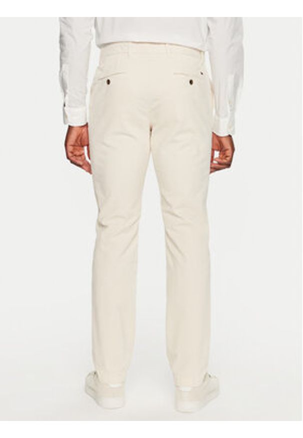 TOMMY HILFIGER - Tommy Hilfiger Spodnie materiałowe MW0MW32932 Écru Regular Fit. Materiał: sztruks