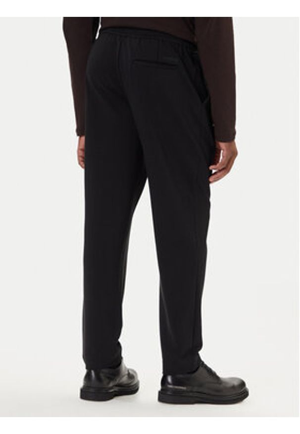 Calvin Klein Chinosy LV04LE613G Czarny Slim Fit. Kolor: czarny. Materiał: wiskoza