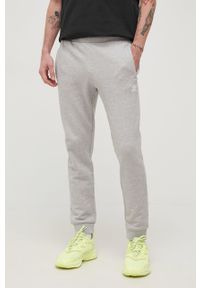 adidas Originals spodnie bawełniane Adicolor HC5125 męskie kolor szary melanżowe. Kolor: szary. Materiał: bawełna. Wzór: melanż #1
