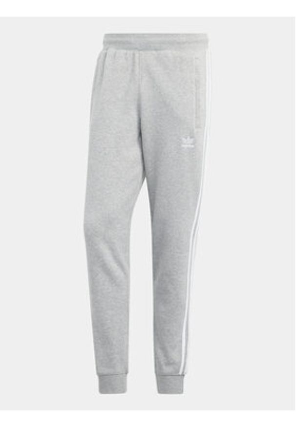 Adidas - adidas Spodnie dresowe adicolor 3-Stripes IM9318 Szary Slim Fit. Kolor: szary. Materiał: bawełna
