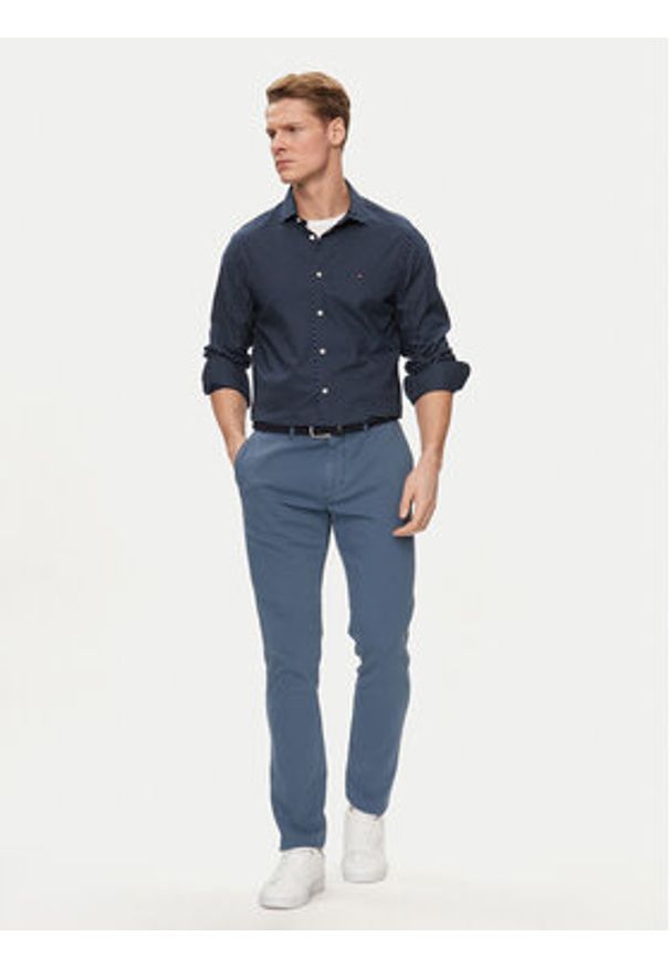 TOMMY HILFIGER - Tommy Hilfiger Chinosy Bleecker MW0MW33910 Niebieski Slim Fit. Kolor: niebieski. Materiał: bawełna