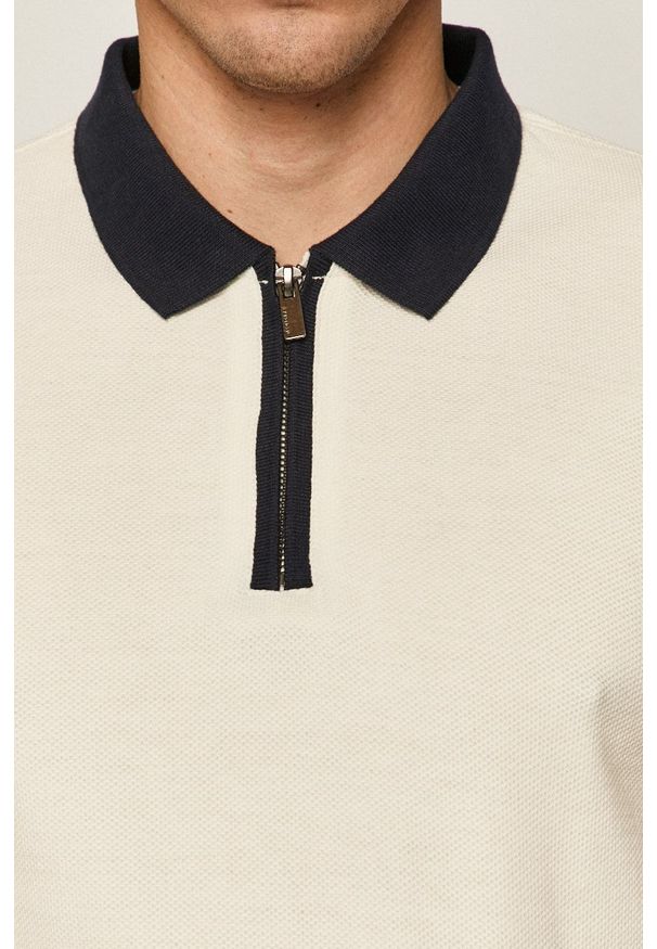 medicine - Medicine - Polo Casual Elegance. Okazja: na co dzień. Typ kołnierza: polo. Kolor: beżowy. Materiał: dzianina. Długość: krótkie. Wzór: gładki. Styl: casual
