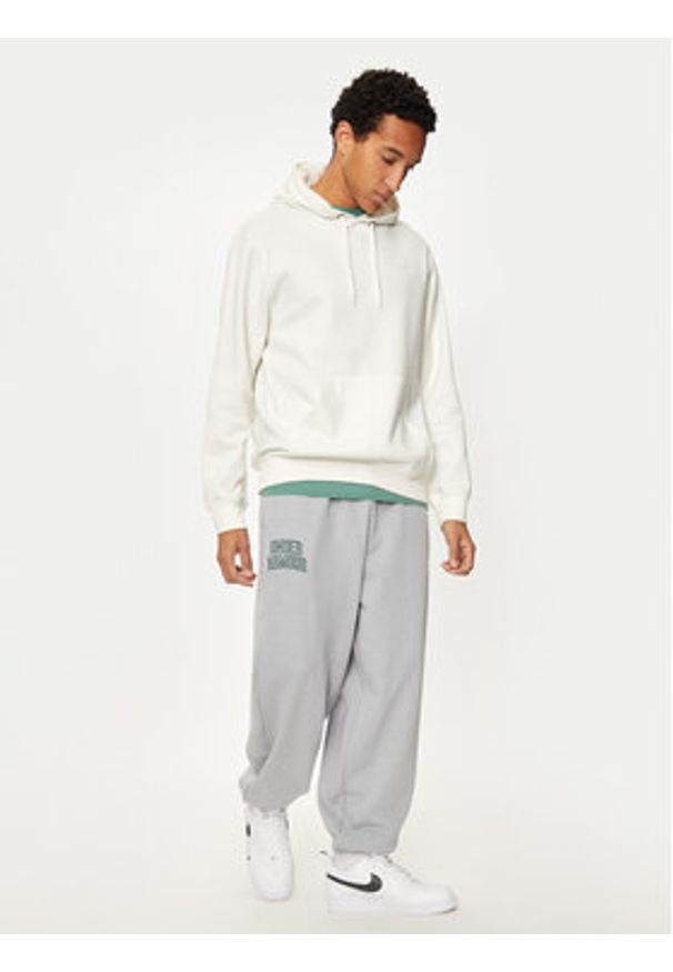Under Armour Spodnie dresowe UA Icon 1386551 Szary Loose Fit. Kolor: szary. Materiał: bawełna