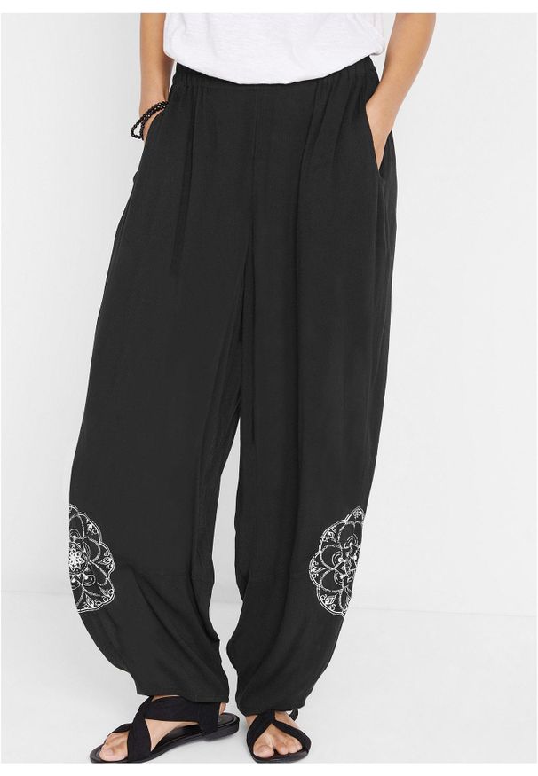 bonprix - Spodnie haremki z wiskozy. Kolor: czarny. Materiał: wiskoza. Wzór: nadruk