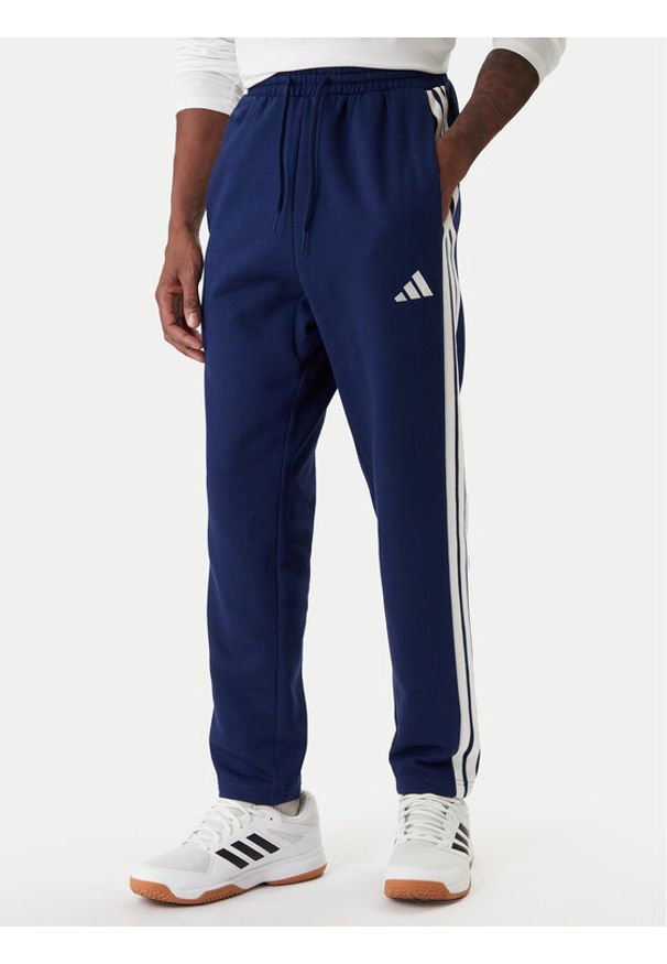 Adidas - adidas Spodnie dresowe Essentials 3-Stripes JE6334 Granatowy Regular Fit. Kolor: niebieski. Materiał: bawełna