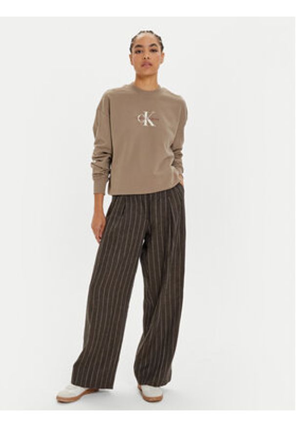 Calvin Klein Jeans Bluza Monologo J20J224177 Beżowy Regular Fit. Kolor: beżowy. Materiał: bawełna