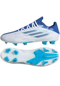 Adidas - Buty piłkarskie adidas X Speedflow.2 Fg M GW7474 wielokolorowe białe. Zapięcie: sznurówki. Kolor: wielokolorowy. Materiał: guma, syntetyk. Sport: piłka nożna