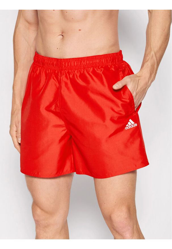 Adidas - adidas Szorty kąpielowe Solid Swim HA0384 Czerwony Regular Fit. Kolor: czerwony. Materiał: syntetyk