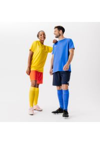KIPSTA - Spodenki piłkarskie Kipsta Viralto Club. Kolor: pomarańczowy. Materiał: poliester, poliamid, materiał, elastan. Sport: piłka nożna