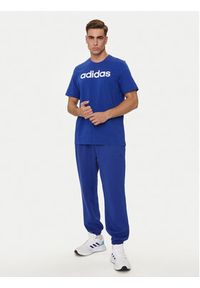 Adidas - adidas Spodnie dresowe ALL SZN IW1186 Niebieski Regular Fit. Kolor: niebieski. Materiał: bawełna