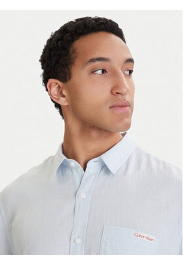 Calvin Klein Jeans Koszula LV04RF120G Błękitny Regular Fit. Kolor: niebieski. Materiał: len