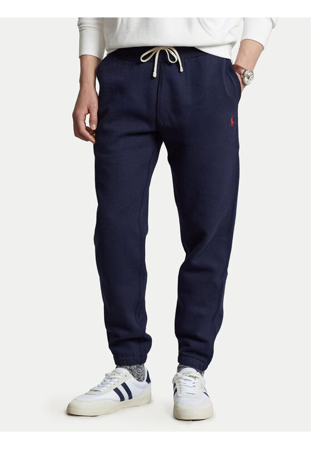 Polo Ralph Lauren Spodnie dresowe 710793939003 Granatowy Relaxed Fit. Kolor: niebieski. Materiał: bawełna, syntetyk
