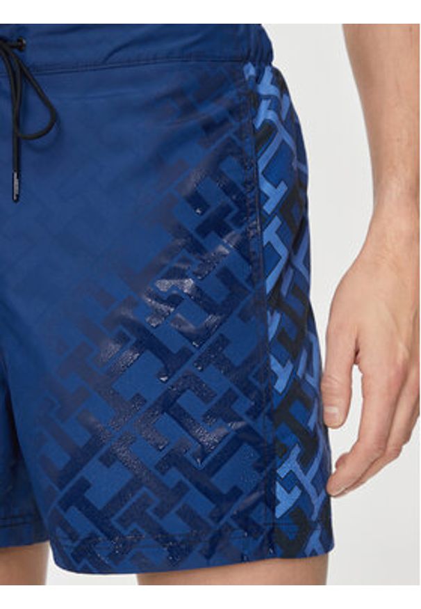 TOMMY HILFIGER - Tommy Hilfiger Szorty kąpielowe UM0UM03211 Granatowy Slim Fit. Kolor: niebieski. Materiał: syntetyk