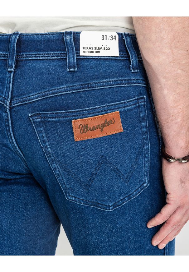 Wrangler - WRANGLER MĘSKIE SPODNIE JEANSOWE WRANGLER TEXAS SLIM BLUE JAM 112358217