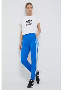 adidas Originals spodnie dresowe kolor niebieski z aplikacją. Kolor: niebieski. Materiał: dresówka. Wzór: aplikacja #2