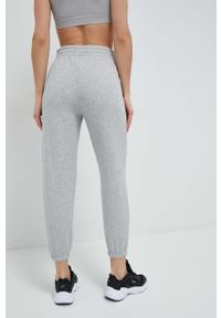Under Armour spodnie dresowe kolor szary gładkie. Stan: podwyższony. Kolor: szary. Materiał: dresówka. Wzór: gładki #3