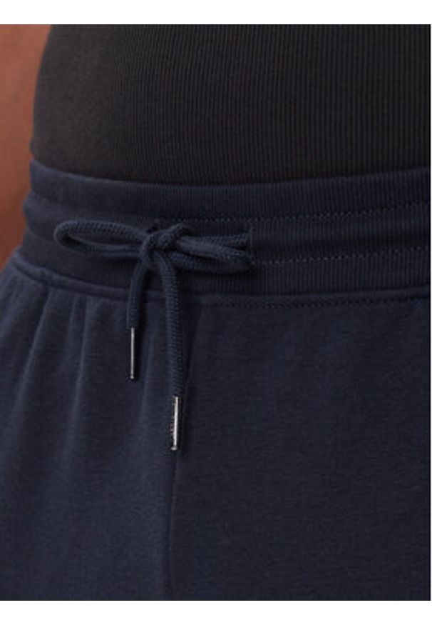 TOMMY HILFIGER - Tommy Hilfiger Spodnie dresowe UM0UM03664 Granatowy Regular Fit. Kolor: niebieski. Materiał: bawełna