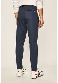 New Balance - Spodnie. Okazja: na co dzień. Kolor: niebieski. Materiał: tkanina, bawełna, elastan. Wzór: gładki. Styl: casual #2