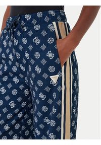 Guess Spodnie dresowe V5YB10 K0282 Granatowy Relaxed Fit. Kolor: niebieski. Materiał: syntetyk #5