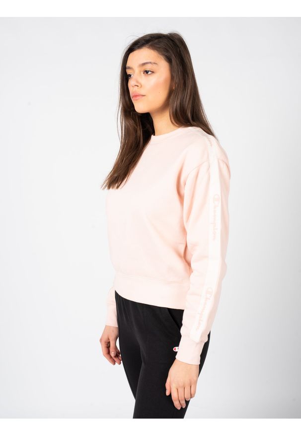 Champion Bluza "C-neck" | 115573 | Kobieta | Różowy. Okazja: na co dzień. Kolor: różowy. Materiał: bawełna, poliester. Długość: krótkie. Styl: klasyczny, elegancki, sportowy, casual