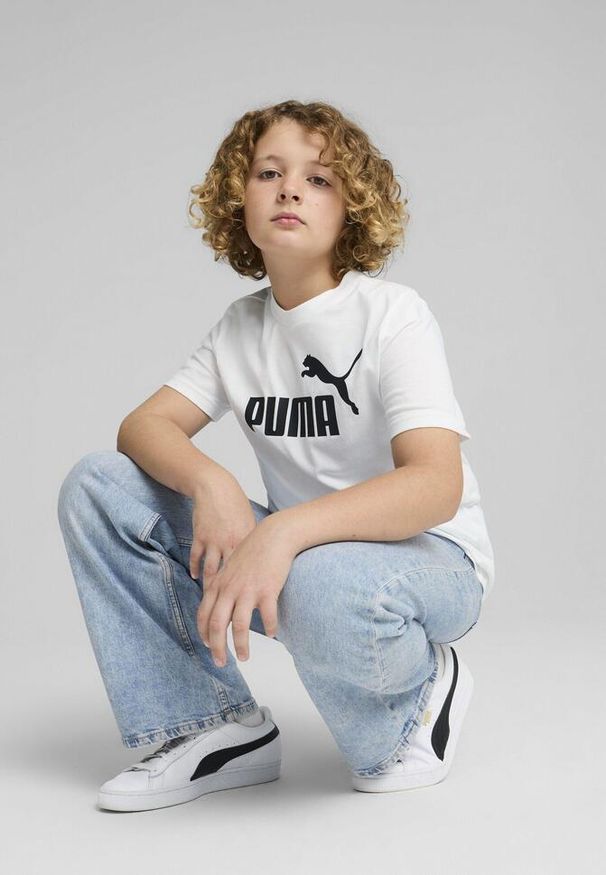Puma - Młodzieżowa koszulka ESS z logo No. 1 PUMA White. Kolor: biały. Materiał: guma. Wzór: nadruk