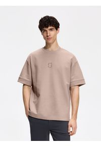 Reserved - T-shirt boxy z nadrukiem - beżowy. Kolor: beżowy. Materiał: bawełna, dzianina. Wzór: nadruk