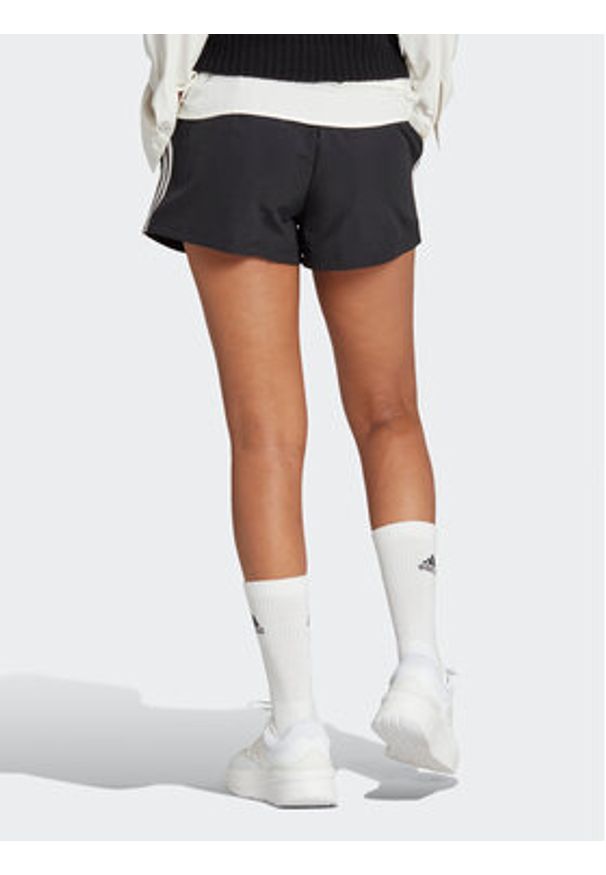 Adidas - adidas Szorty sportowe Essentials 3-Stripes HT3397 Czarny Loose Fit. Kolor: czarny. Materiał: syntetyk