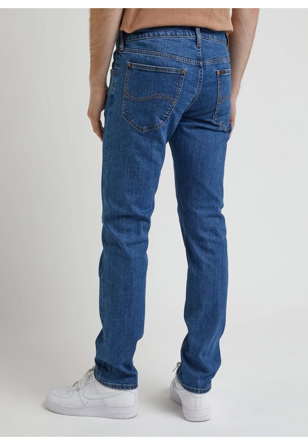 Lee - LEE DAREN ZIP FLY MĘSKIE SPODNIE JEANSOWE STONEAGE MID L707KND14 112338472