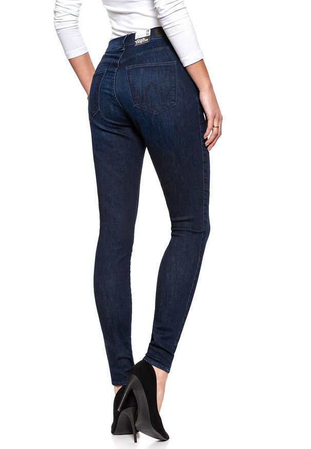 Wrangler - WRANGLER SUPER HIGH SKINNY TAINTED BLUE W27WSZ21H 112128196. Stan: podwyższony. Wzór: jednolity