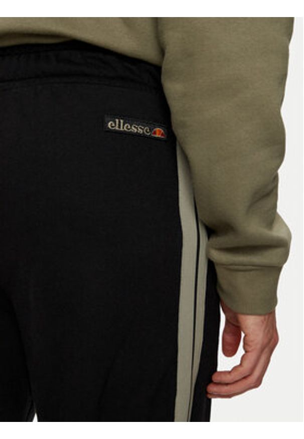 Ellesse Spodnie dresowe Unisex Nioro SHX21064 Czarny Regular Fit. Kolor: czarny. Materiał: bawełna