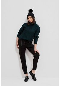 MOODO - Dresowe spodnie z zapinanymi kieszeniami czarne. Stan: podwyższony. Kolor: czarny. Materiał: dresówka. Długość: długie. Wzór: gładki #1