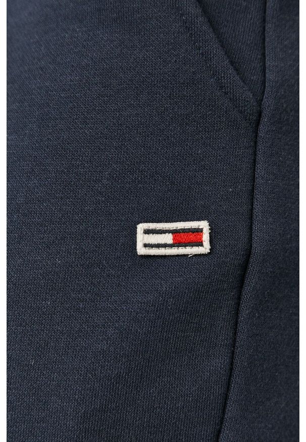 Tommy Jeans - Spodnie. Kolor: niebieski